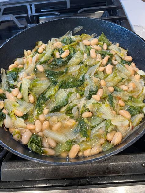 Escarole and Beans is a classic Italian-inspired dish that’s both simple and satisfying. Combining the tender, slightly bitter escarole with creamy cannellini beans, this recipe is a comforting blend of flavors and textures. The dish is enhanced by garlic, red pepper flakes, and fresh parsley, offering a light yet hearty meal that’s rich in nutrients. […] Escarole And White Beans, Cannellini Bean Recipes, Escarole And Beans, Escarole Recipes, Bean Soups, White Bean Soup Recipes, Slow Cooked Chicken, Grilled Sausage, Bean Soup Recipes