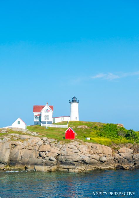 Nubble Lighthouse, Kittery, Maine (York) on ASpicyPerspective.com #travel Nubble Lighthouse, Maine In The Fall, Kittery Maine, York Maine, A Spicy Perspective, Maine Lighthouses, New England Road Trip, Maine Coast, Seaside Village