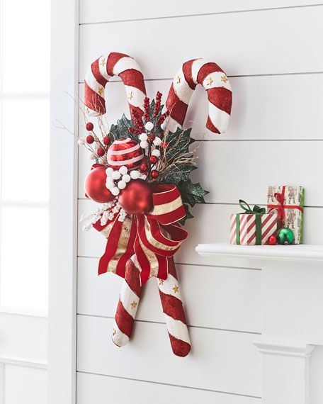 CHRISTMAS DECOR Get a jump start on the season! Find stunning Christmas decor, from faux florals and garlands to gorgeous topiaries, ornaments and gingerbread houses. We'll be hand-selecting a bright and fun selection of Christmas stockings, pillow covers, bedding Santa's and Angels. Check back and browse through a gorgeous collection of Christmas home decor. Bright Christmas Decorations, Candy Cane Candy, Christmas Candy Cane Decorations, Candy Cane Crafts, Candy Cane Decorations, Candy Christmas Decorations, Christmas Door Decorations, Candy Land Christmas, Christmas Floral