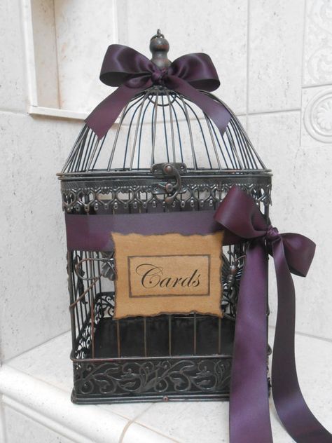 This is super cute for the guests to put the wedding cards in.  :)  You can probably find something similar at a 2nd hand store, and spray paint it a black/grey color, and just add pretty bows.   With a little old looking sign attached it's cute & vintage looking. Birdcage Wedding, Dark Romantic Wedding, Gift Card Displays, Wishing Wells, Holly Wedding, Patriotic Projects, Wedding Birdcage, Wedding Card Holder, Money Holder