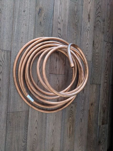 This instructables will serve as a general guideline on how to build you own spiraling tree. I do not have any measurements on hand as everything was pretty much improvised. Add TipAsk QuestionCommentDownload Step 1: Materials 2 More Images 1 x 25 foot 1/2 inch copper tubing/copper refrigeration coil. This is the main spiral of the tree https://www.renodepot.com/en/copper-pipe-0144048 1 or 2 x 6 feet 1/2 straight copper tube. This will serve as internal support for the tree ht Copper Tubing Projects, Copper Pipe Projects, Copper Tube, Copper Diy, Spiral Shape, Support Structure, Copper Pipe, Copper Tubing, Tree Shapes