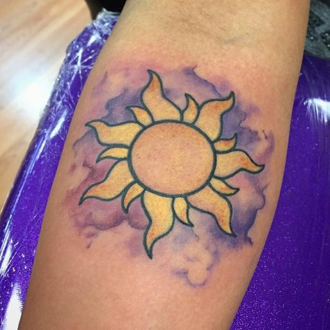 Tangled sun tattoo Disney Tangled Tattoo, Tangled Sun Tattoo, Sun Tangled, Rapunzel Tattoo, Disney Inspired Tattoos, Tangled Sun, Colour Tattoo For Women, Inspiration Tattoos, Tattoo For Son