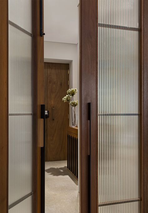 WORLI RESIDENCE II • We Design Studio • Architects & Interior Designers in Mumbai, India Entry Vestibule, Wooden Glass Door, Glass Door Design, Sliding Door Design, Glass Doors Interior, Door Design Modern, Door Design Interior, Main Door Design, Home Design Living Room