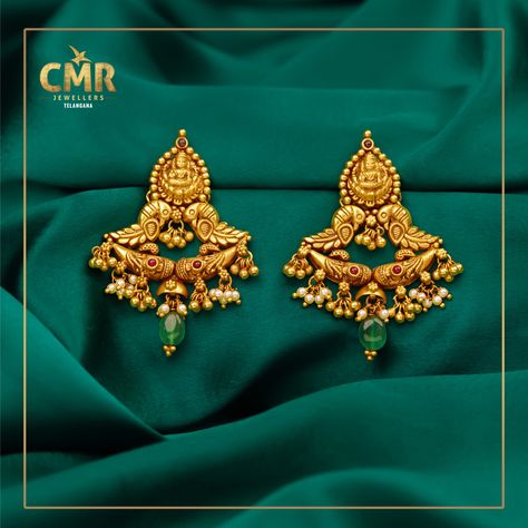 Ace up your traditional look with this enticing pair of earrings in Lakshmi Devi model. Engraved with Chandabali design is engraved and golden drops. Loved it? Then, grab it!! To get the details of this beautiful Jeweler WhatsApp +91 8881881193. . . . #onlineshopping #cmrjewellerytelangana #cmrjewellery #cmrnecklace #chorker #earings #cmrbangles #cmr #cmrj #bangles #jewelry #earrings #necklace #chorker #gold #jewellerydesign #ring #followers #follow #like #followforfollowback #jewels #jewelryd Cmr Jewellers Necklace, Lakshmi Devi Earrings Gold, Cmr Jewellers, Chand Bali Earrings Gold, Gold Flower Bracelet, Gold Earrings Indian, Lakshmi Devi, Gold Jewels Design, Modern Gold Jewelry