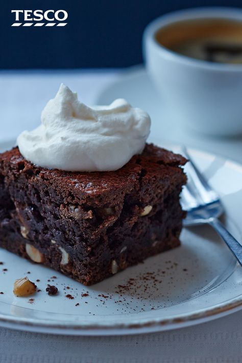 This chocolate brownie recipe is made all the more decadent through coffee liqueur, vodka and hazelnuts - a gorgeous baking recipe inspired by the White Russian cocktail. | Tesco Chocolate Fridge, Chocolate Fridge Cake, Broken Biscuits, Fridge Cake, Dessert Recipies, Tesco Real Food, Coffee Liqueur, No Bake Brownies, White Russian