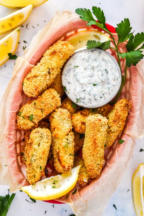 Baked to crispy perfection, these Freezer-Friendly Homemade Fish Sticks are made with cod and served with the best yogurt tartar sauce! Try these fish sticks for a weeknight meal or make-ahead and freeze - instructions included! ProjectMealPlan.com Freezer Fish Meals, Freeze Salmon, How To Freeze Fresh Shrimp, Freezer Meal Chicken Drumsticks, Homemade French Toast Sticks Freezer, Fish Sticks, Small Cucumber, Prepped Lunches, Cooking With Olive Oil