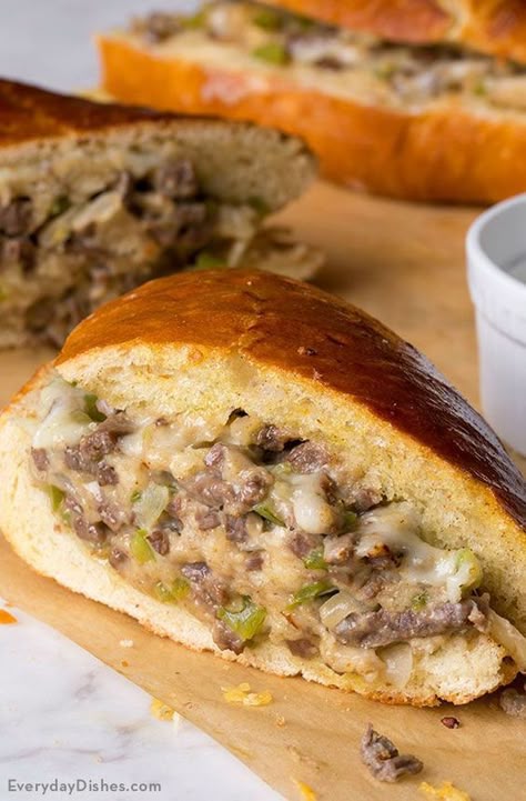 Steak and cheese stuffed French bread recipe Philly Cheese Steak French Loaf, Stuffed Bread Recipes Meat, French Bread Subs, French Bread Stromboli, Stuff French Bread, French Bread Philly Cheese Steak, French Loaf Recipe Ideas, Stuffed French Bread Ground Beef, Dinner Ideas With Bread