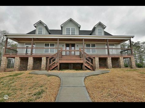 Front elevated porch! #remodelingourhome Elevated Ranch Style Homes Exterior, Elevated Porch Landscaping, Raised House Landscaping, Raised House Design, Elevated Front Porch Ideas, Raised Front Porch, Elevated Front Porch, Tall Front Porch, Elevated Porch