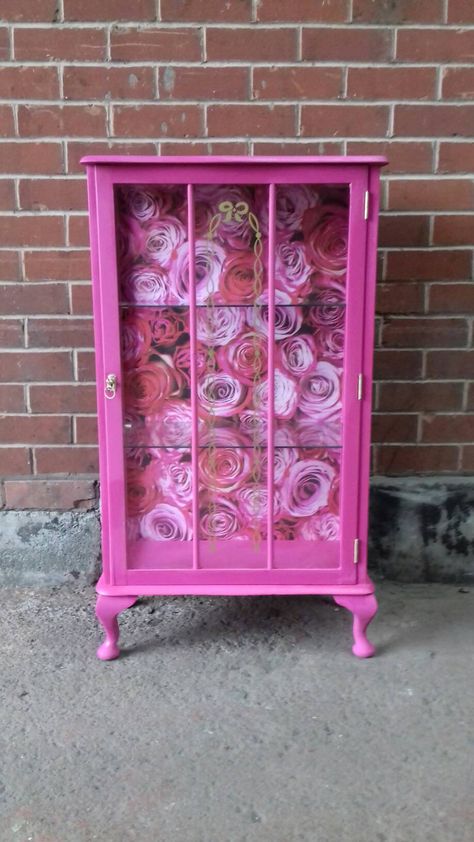 A stunning display cabinet. The cabinet is a genuine piece of vintage furniture that has been given an amazing one off unique look. The chest is made of solid wood that has been coloured a gorgeous vibrant pink. On each of the sides there are glass panels and to the front there is a door with two p Painted Display Cabinet, Cabinet Of Curiosity, Cabinet Vintage, Upcycle Ideas, Vintage Cabinet, Decoupage Furniture, Glass Cabinets Display, Display Cabinets, The Cabinet