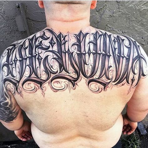 Mens Back Perfect Lettering Tattoo Chicano Font, Tattoo Calligraphy, Backpiece Tattoo, Tattoo Lettering Design, Tattoo Lettering Styles, Gangsta Tattoos, Chicano Tattoo, Aztec Tattoo, Red Ink Tattoos