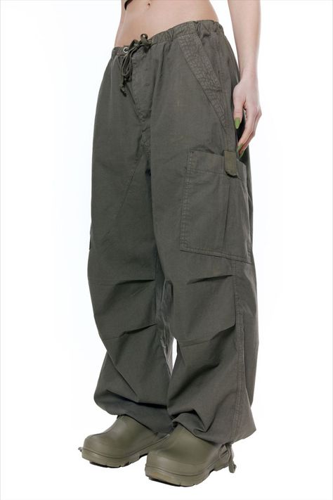 khaki parachute cargo pants 
oversized fit
six-pocket styling
elasticated waistband with adjustable cotton drawcord through metal eyelets 
metal zip fly front with bar tack detail & concealed button closure 
pleated knee
adjustable cotton drawcord at cuff
inside leg darts 
inside leg measures 73cm 
size s = uk 8-10
model is 5 ft 8 and wears a size s Green Cargo Pants Outfit Fall, Jaded London Parachute Pants, Cargo Pants Outfit Fall, Green Cargo Pants Outfit, Green Cargos, Cargo Parachute Pants, Celana Kargo, Parachute Cargo Pants, Parachute Cargo