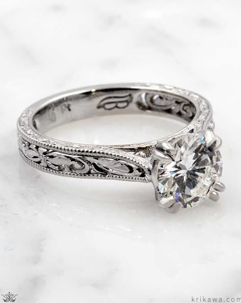 A beautiful marriage of vintage details and natural elements, this engagement ring features a double-prong set solitaire stone. The band is hand-engraved with scrollwork vines framed by hand-rolled millegrain. Cheap Vintage Engraved Engagement Ring, Welded Engagement Ring, Vintage Western Engagement Rings, Silver Engraved Engagement Ring, Southern Engagement Rings, Tooled Engagement Rings, Boho Engagement Ring Silver, Smiple Western Wedding Rings, Engagement Ring Engraved Band