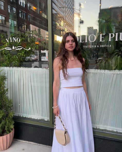 see how I support my local italian restaurant instead of flying all the way to italy? very mindful, very demure @hm @commense.official euro summer aesthetic, cute italian bistros, cafe vibes, minimalist fashion, neutral outfit inspo, all white look, tube tops, full maxi skirts, gold jewelry, olives and pasta Euro Summer Aesthetic, Commense Official, Cafe Vibes, Italian Bistro, Full Maxi Skirt, White Look, Euro Summer, Tube Tops, Aesthetic Cute