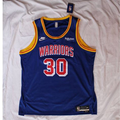 A Steph Curry Golden State Warriors Jersey In Size 2xl Is An Officially Licensed Nba Basketball Jersey That Features The Player's Name And Number On The Back, As Well As The Warriors' Team Logo On The Front. It Is Made Of High-Quality, Breathable Fabric To Keep You Cool And Comfortable During The Game. The Jersey Is Primarily Blue With Yellow And White Accents, Representing The Warriors' Team Colors. The Number On The Back Is "30", Which Is The Number Curry Currently Wears For The Warriors. The Steph Curry Jersey, Golden State Warriors Jersey, Basketball Jersey Outfit, Curry Jersey, Warriors Jersey, Nba Basketball Jersey, Best Jersey, Nba Shirts, The Warriors