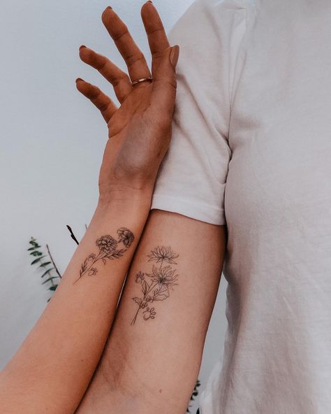 Tattoo artist: Alina Meshadi Minimal Chrysanthemum Tattoo, Marigold Wrist Tattoo, Marigold Fine Line Tattoo, Dainty Marigold Tattoo, Cosmo And Marigold Flower Tattoo, Fine Line Chrysanthemum Tattoo, Marigold Flower Tattoo, Flower Tats, Marigold Tattoo