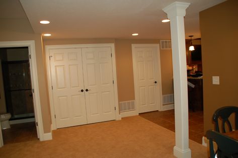 How To Hide Water Heater In Basement, Hiding Hvac In Basement, Hidden Furnace And Water Heater, Hidden Water Heater, Finished Basement Doors For A Furnace, Storage In Basement, Hidden Sump Pump Basement, Hide Water Heater, Framing Around Basement Plumbing