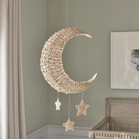 Add a touch of boho charm with our moon and stars mobile. Crafted of handwoven rattan, it adds natural texture and celestial dimension to their space. DETAILS THAT MATTER Mobile is made of wrought iron. Features unique details of moon and stars design made of Rattan. Finished in a hand painted oil-based, semi-gloss paint. Can be mounted on dry wall. KEY PRODUCT POINTS Pottery Barn Kids exclusive. Hardware is not included. Wipe clean. Imported. Nordic Baby Room, Moon Stars Nursery, Star Themed Nursery, Stars Mobile, Kawaii Home, Moon Mobile, Space Themed Nursery, Moon Nursery, Star Mobile