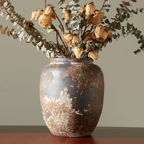 PRICES MAY VARY. 【Large Pottery Vase】Neutral terracotta vase with exquisite texture and design. With its warm neutral color and special texture that matches any floral arrangement, this rustic vase will be a unique addition to your home. 【Rustic Ceramic Vase】Returning to the simplicity of nature and the classic pastoral style design, the surface of each vase is purely handmade with three-dimensional textures, making beauty within reach. 【Multipurpose】This pottery vase can be a prefect decoration Rustic Vases Centerpieces, Fall Interior Decor Living Rooms, Japandi Decor Accessories, Pampas In Vase, Warm Rustic Living Room, Rustic Vase Centerpieces, Rustic Dining Table Centerpiece, Redwood House, Bronze Autumn