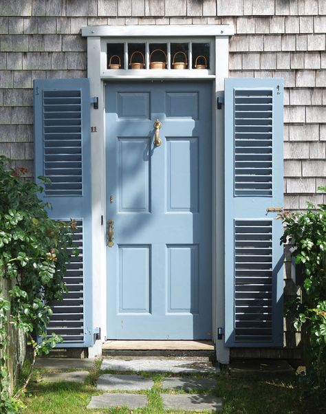 A doorway decorated with tiny lightship baskets, just outside downtown Nantucket. Nautical Front Door Decor, Exterior Door Colors, Collection Board, Blue Doors, Vibeke Design, Blue Front Door, Door Paint Colors, Painted Front Doors, Blue Pastel