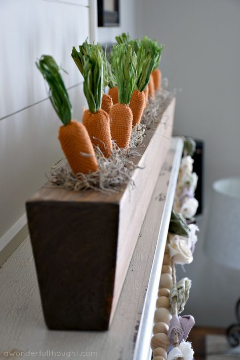 Easter Mantel and Vignette #easter #easterdecor #springmantel #eastermantel #eastervignette #carrotmantel #awonderfulthought Easter Mantel Ideas, Carrot Easter Decor, Easter Decor With Carrots, Carrots In Vase Centerpiece, Easter Carrot Centerpiece, Sugar Mold Decor Ideas, Easter Flowers With Carrots, Sugar Molds Decor, Wooden Sugar Molds