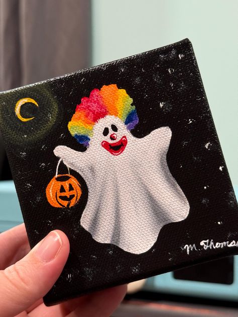 "Clownin' Around Ghost" is an original acrylic painting by me. You will be receiving the original 4"x4" canvas painting. You can hang this piece or display it in a tabletop.  Please reach out for any further questions. 😊 Kid Halloween Painting Ideas, Two Ghost Painting, Simple Spooky Painting Ideas, What To Paint With Acrylic Paints, Ghost Canvas Paintings Easy, Vampire Painting Easy, Tiny Canvas Painting Halloween, Things To Paint On Ur Wall, Ghost Family Painting