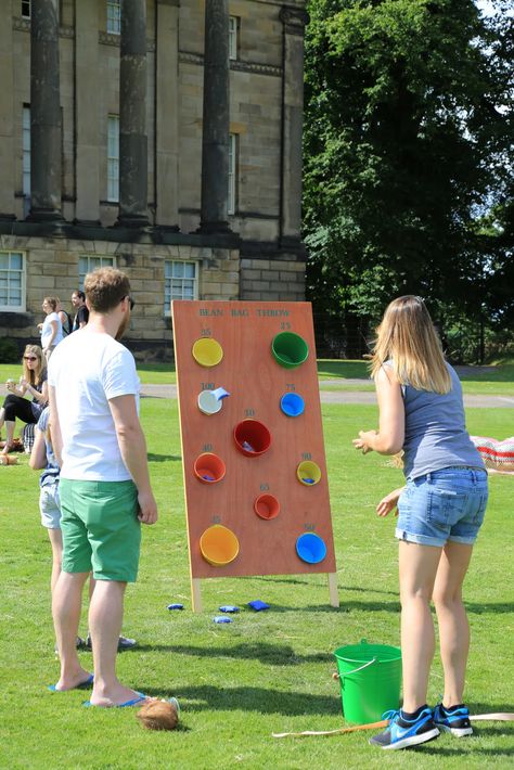 Bean bag throw Bean Bag Throw Game, Beach Carnival, Leaving Party, Village Fete, Carnival Ideas, Parlor Games, Bean Bag Toss Game, English Village, Bean Bag Toss