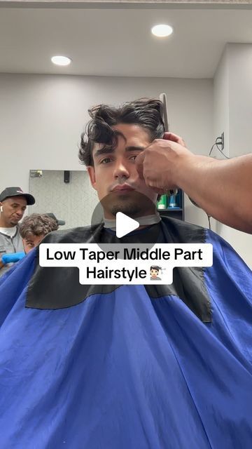 Marcos Philip on Instagram: "Low taper middle part hairstyle 💇🏻 
.
.
Yall rock with the cut? 🤔
.
#marcosphilip #hairstylevideo #hairstyleideas #hairstylemen #hairstyleoftheday" Mens Hairstyles Middle Part Fade, Middle Part With Taper, Low Taper Fade Haircut Wavy Hair, Middle Fade Haircut Men, Middle Part Fade Men, Short Middle Part Men, Middle Part Hairstyles Men Wavy, Low Taper Fade Middle Part, Blowout Taper Middle Part