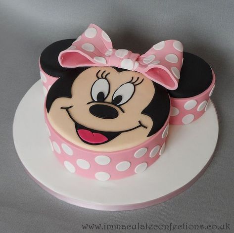 minnie-mouse-birthday-cake-in-the-shape-of-minnies-face-white-cake-stand Mickymaus Birthday Cake, Minnie Mouse Cupcake Cake, Mini Mouse Birthday Cake, Γενέθλια Mickey Mouse, Disney Princess Birthday Cakes, Minnie Mouse Birthday Cake, Mouse Birthday Cake, Minnie Mouse Birthday Cakes, Minnie Mouse Cupcakes