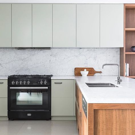 Another beautiful shot of this Blue Tea kitchen Designer: Ciara Cabinetry: Dulux Cat Mint Polyurethane Feature timber: spotted gum crown cut marble: arebescato vagli Oven by @falconaustralia Hardware: @blumaustralia Photography @pablo__veiga . . . . . . . . #kitchen #kitchendesign #kitchendesigner #kitchendesignersydney #interiordesignsydney #interiordesigner #sydney #melbourne #australia #home #interiordecor #design #instadesign #joinery #detail #renovation #kitchenrenovation #kitchenideas #... Vinyl Cabinet, Wood Shelves Kitchen, European Kitchen Cabinets, Award Winning Kitchen, Bathroom Floor Plans, European Cabinets, Blue Tea, Contemporary Cabinets, Kitchen Installation