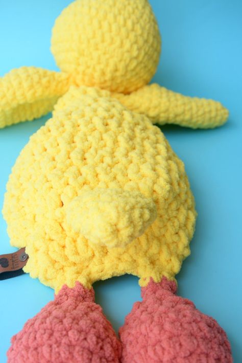 Make something special for someone special with this crochet duck pattern! It is beginner friendly and is made with super bulky weight yarn so it works up quickly. It will make the sweetest gift for a new baby or toddler's birthday. Duck Snuggler Crochet Pattern Details Written in U.S. crochet terms in English Contains step-by-step instructions Delivered as a PDF Finished duck is approx. 23 inches in length Made with super bulky weight yarn This duck snuggler crochet pattern helps you make the s Duck Snuggler, Snuggler Crochet Pattern, Crochet Duck Pattern, Crochet Lovey Pattern, Duck Lovey, Crochet Snuggler, Crochet Lovey Free Pattern, Duck Stuffed Animal, Duck Crochet