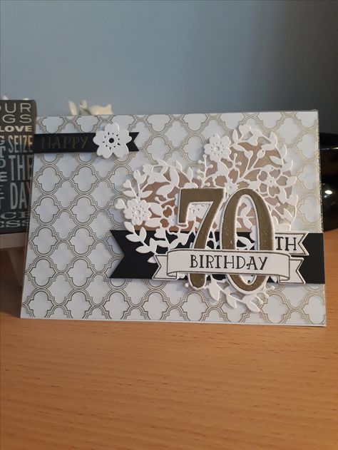 70th Birthday Card using Stampin Up Number of Years stamps and Large Numbers Framelits with Sweet & Sassy Framelits and Bloomi' Heart Thinlits, also using Fabulous Foil Designer Acetate for the overlay with Whisper White and Basic Black card, VersaMark Ink and Gold Emboss Powder Stampin Up 70th Birthday Cards, 70th Cards For Women, Handmade 70th Birthday Cards For Women, Cricut 70th Birthday Card, Stampin Up Number Of Years, 70 Cards 70th Birthday, Stampin Up Gold Foiled Flowers Cards & Envelopes, 70th Birthday Card, Acetate Cards