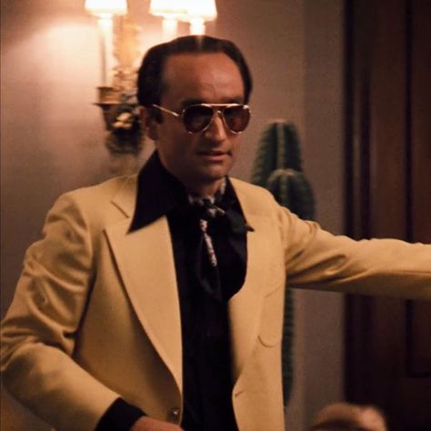 BAMF Style (@bamfstyle) posted on Instagram: “In the spirit of “new year, new you,” Fredo Corleone (John Cazale) reinvented himself from forgotten brother to flamboyant swinger after…” • Jan 10, 2022 at 5:32pm UTC 50s Sportswear, Fredo Corleone, John Cazale, Pucci Pattern, Moving To Las Vegas, The Godfather Part Ii, Europe 2023, Black Silk Scarf, Robert Duvall