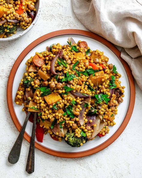 Embrace fall with this easy roasted pumpkin couscous salad with mixed roasted veggies, pepitas, & dried cranberries! A satisfying dairy-free, vegan fall salad! #plantbasedonabudget #pumpkin #couscous #salad Vegan Fall Salad, Pumpkin Couscous, Salad With Roasted Veggies, Roast Pumpkin Salad, Mediterranean Couscous, Cold Salads, Plant Based Recipes Dinner, Pumpkin Salad, Fall Salad