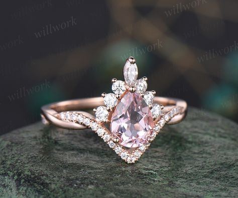 - Metal: Solid gold(10K/14K/18K white/yellow/rose gold),925 sterling silver,platinum available- Main Stone: 6x8mm pear cut natural pink morganite- Accent Stone: VS moissanites- Wedding Band Stone: lab opals- Can be personalized: Yes Pink Wedding Band, Pink Stone Engagement Rings, Whimsical Ring, Pink Wedding Rings, Pink Diamond Engagement Ring, Pink Morganite Ring, Rose Gold Morganite Ring, Cute Engagement Rings, Gold Engagement