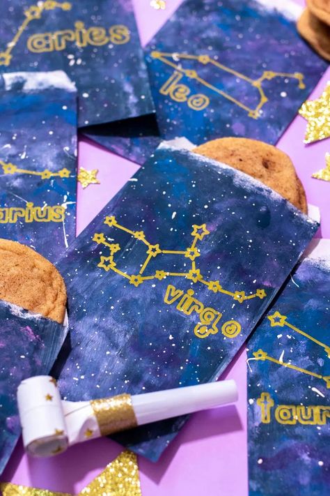 Make a set of zodiac treat bags with Cricut Joy! #ad Cricut is the perfect tool for drawing complex designs like the zodiac signs on galaxy-inspired treat bags for any space-themed party or event! Use paint to quickly create a galaxy pattern, and finish the treat bags with Cricut Joy Markers for personalization. Finally, cut out glittery stars to add to your celebration! // #cricutmade #cricutjoy #cricutideas #cricutmarkers #zodiacparty #galaxycrafts #partycrafts #papercrafts #galaxypaint Zodiac Birthday Party, Zodiac Party Theme, Zodiac Theme Party, Astrology Party, Zodiac Party, Astrology Themed Party, Constellation Craft, Kids Craft Box, Aquarius Birthday