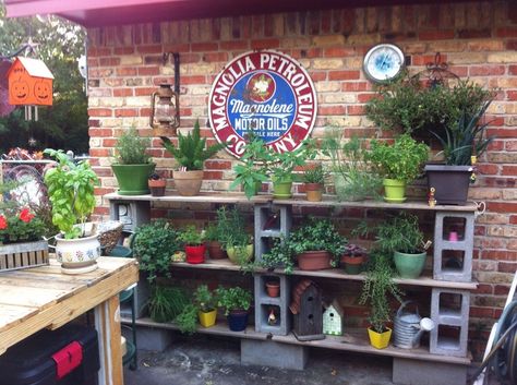 cinder block shelving ideas | Boards and cinder blocks make great shelves for an herb garden. Concrete Block Plant Stand, Diy Plant Shelf Outdoor, Mexican Backyard, Block Shelves, Plant Shelves Outdoor, Cinder Blocks Diy, Herb Garden Pallet, Cinder Block Garden, Prayer Garden