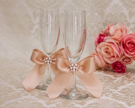 "Rose Gold Wedding Flutes, Champagne Flutes, Wedding Glasses, Rose Gold Toasting Flutes, Rose Gold Champagne Glasses, Blush Wedding This listing is for the set of 2 champagne glasses. Toasting flutes for the bride and groom decorated with Blush ribbons. The flutes are accented with pretty ROSE GOLD rhinestone pearl gems. These wedding champagne glasses are made to match wedding accessories set that is available here https://www.etsy.com/listing/535412979 Your guests will be so impressed with the Gold Champagne Glasses, Champagne Glasses Decorated, Wedding Knife Set, Champagne Flutes Wedding, Wedding Cake Serving Set, Blush Wedding Decor, Rose Gold Wedding Cakes, Wedding Cake Server Set, Rose Gold Cake