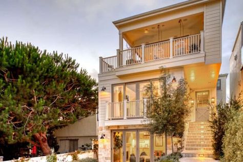 See this stunningly beautiful coastal style farmhouse in Manhattan Beach Front Porch Lighting, Stone Facade, Exterior Paint Color, Beach Bungalows, Coastal Farmhouse, Manhattan Beach, House Paint Exterior, California Beach, Modern Coastal