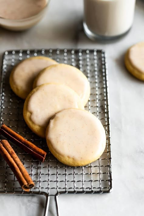 Soft, cut-out sugar cookies topped with a coquito (Puertorican eggnog) icing made with full-fat coconut milk, cinnamon, and rum spiked icing. #cookies Coquito Cookies Recipe, Coquito Cookies, Cookie Catering, Eggnog Icing, Coconut Sugar Cookies, Latin Desserts, Sour Milk, Eggnog Cookies, Puerto Rico Food