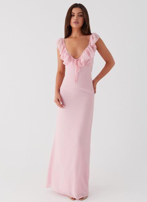 Peppermayo Exclusive Elevate your evening look with the Silvie Maxi Dress. Featuring a V neckline, frill straps, and delicate frill detailing at the neckline. Embrace the magic of balmy nights and shimmering silhouettes.       - Maxi length- V neckline- Frill straps and neckline detail- Open back- Adjustable straps- Ti Pink Revolve Dress, Rehearsal Dinner Dress Pink, Frilly Bridesmaid Dress, Pretty Pink Dresses Classy, Pink Maxi Dress Aesthetic, Revolve Dress Long, Pink Banquet Dresses, Pink Asymmetrical Dress, Fun Pink Dress