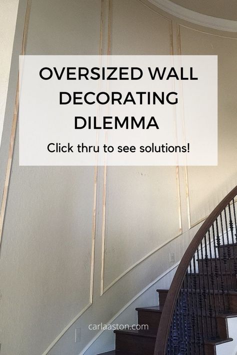 Oversized, awkward wall spaces can look especially bare if not treated somehow. Use trim moulding to help break up the big wall space and then you don’t HAVE to buy a bunch of big art pieces or lay out a complicated gallery wall. See more examples by linking through. carlaaston.com