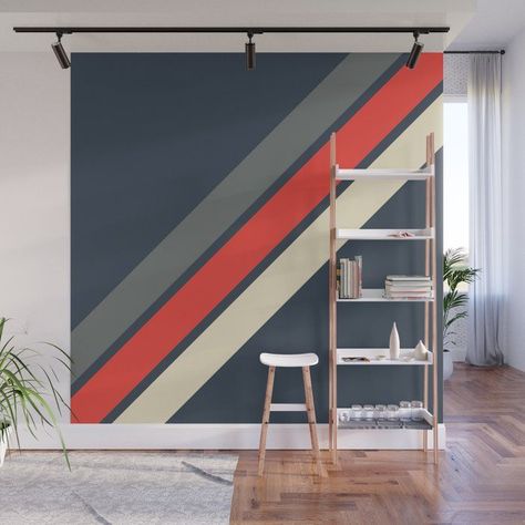 Focus on functional furniture with a retro aesthetic. Use wooden pieces, tapered legs, and bold, geometric patterns to capture this timeless style. Simple Geometric Wall Paint Bedroom, Wall Lines Paint Stripes, Simple Geometric Wall Paint, Geometric Wall Paint Patterns, Geometric Wall Paint, Wall Paint Patterns, Diy Wall Painting, Room Wall Painting, Striped Walls