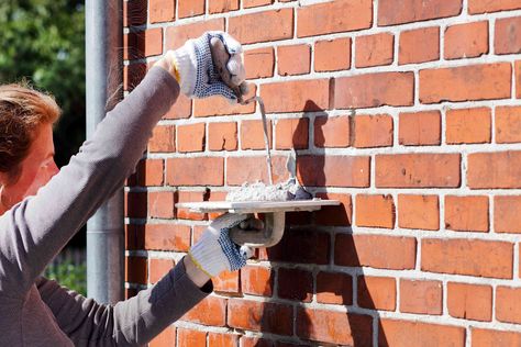 Tuckpointing brick can help it last longer while making it more beautiful than ever before. Learn what tuckpointing is and how to tell if your home needs it. Mortar Repair, Brick Ranch Houses, Brick Repair, Brick Face, Brick Walkway, All White Kitchen, House Siding, Brick Patios, Grout Color