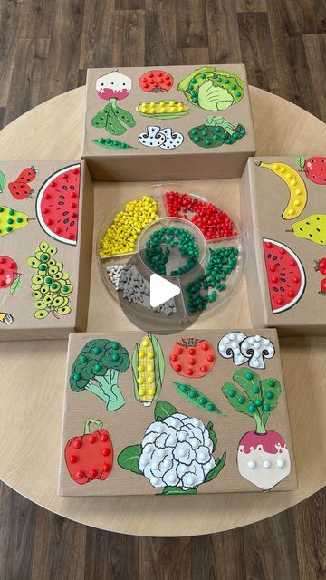 Louise on Instagram: "Vegetable and fruit peg boards 🥦🌽🫛🍉🍓  A great activity for fine motor skills and hand eye coordination. We also used the activity to talk about healthy eating and names of the fruit and vegetables.  I was inspired by the brilliant @reception_eyfs_teacher to make my own peg boards using the lids from the A4 paper boxes.  Vegetable and fruit images from @twinklresources   #finemotorskills #handeyecoordination #foodtopic #colourmatching #pegboards #eyfs #earlyyears #eyfsideas #nursery #eyfsteacher" Healthy Food Kids Activities, Fruit Eyfs Activities, Vegetable Theme Preschool, Healthy Food Projects For Kids, Fruit And Veg Eyfs Activities, Art And Craft Fruits Preschool, Healthy Living Activities For Kids, Vegetables Craft, Olivers Fruit Salad Activities Eyfs