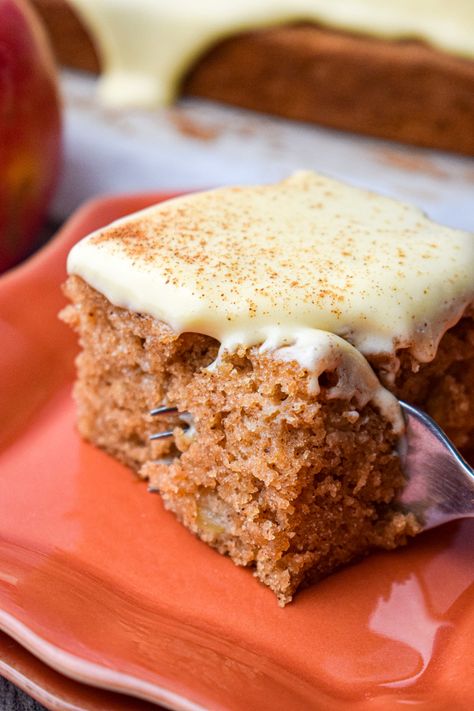 This moist and delicious Applesauce Spice Cake is so easy to throw together and is the perfect fall dessert or snack! Applesauce Spice Bundt Cake Recipes, Apple Pumpkin Bundt Cake Recipes, Apple Spice Cake Bars, Spiced Applesauce Cake, Apple Sauce Baked Goods, Spice Cake With Applesauce, Spice Dessert Recipes, Dessert With Applesauce, Healthy Spice Cake Recipes