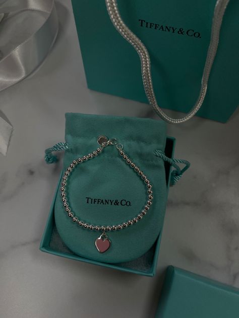 #tiffanyandco #tiffany #jewelry #pink #aesthetic #fashion #trendy #losangeles #newyork #malibu #sliver #gold Tiffany Pink Heart Bracelet, Tiffany’s Aesthetic, Tiffany Bracelet Aesthetic, Gf Proposal, Pink Aesthetic Fashion, Pink Heart Bracelet, Bracelet Aesthetic, Tiffany Bracelet, Tiffany Bracelets