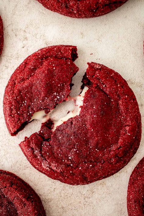 These thick, soft and chewy stuffed red velvet cream cheese cookies have the best flavors of red velvet cake. Stuffed with a tangy, fluffy cream cheese frosting, these cookies are perfect for a gift, cookie swap or holiday event. Red Velvet With Cream Cheese Frosting, Red Velvet Cookies With Cream Cheese Filling, Cream Cheese Stuffed Red Velvet Cookies, Red Velvet Stuffed Cookies, Red Themed Food, Red Velvet Cookies With Cream Cheese, Red Velvet Cream Cheese Cookies, Red Velvet Christmas Cookies, Christmas Cookies Red Velvet