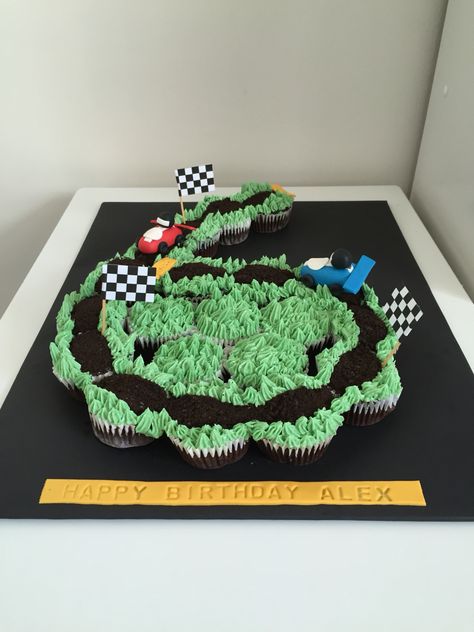 Race track cupcakes #racecar #track #cupcake #number #6 Cupcake Race Track, Race Track Cupcake Cake, Race Theme Cupcakes, Racecar Cupcakes Ideas, Number 6 Cupcake Cake, Race Cupcakes, Two Fast Party, Monster Truck Birthday Cake, Truck Birthday Cake