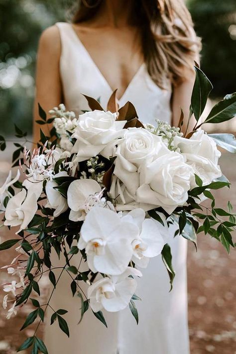 white wedding bouquets inspiration cascading bridal bouquet with orchid and roses with greenery jannekestorm Pretty Wedding Bouquet, Bridal Jewlery, Wedding Flower Guide, Cascading Bridal Bouquets, All White Wedding, White Bridal Bouquet, White Wedding Bouquets, White Wedding Flowers, Wedding Forward