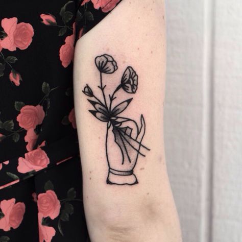 Black and gray traditional hand holding flowers arm tattoo Holding Flowers Tattoo, Traditional Hand Tattoo, Hands Holding Flowers, Tattoo Old School, Handpoke Tattoo, Flower Tattoo Arm, Tattoo Traditional, Flowers Tattoo, Holding Flowers